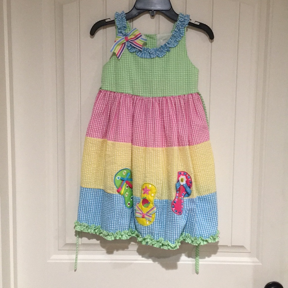 Multi colored girls dress with flip flops
